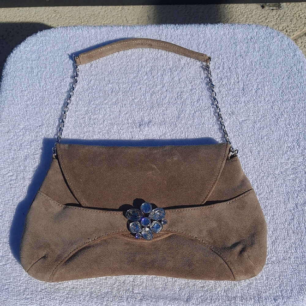 Elegant Tan Suede Clutch with Floral Accent By Swarvoski.